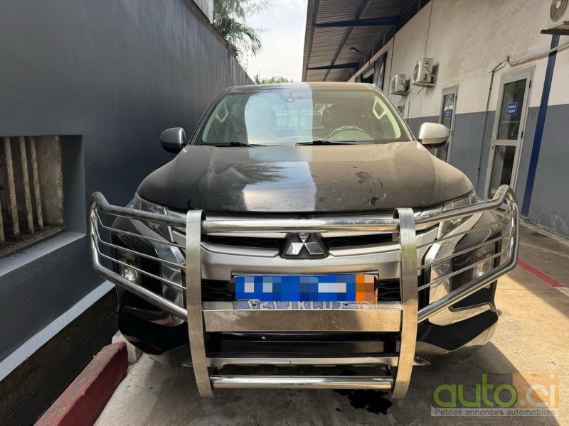 Photo 3 AUTO.CI : Mitsubishi L200 2.0L 