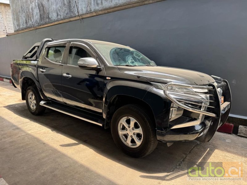 Photo 4 AUTO.CI : Mitsubishi L200 2.0L 